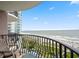 Scenic view from a private balcony overlooking the beach, ocean, and nearby amenities at 2500 N Ocean Blvd. # 601, Myrtle Beach, SC 29577