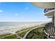 Stunning oceanfront view from private balcony with wrought iron railing overlooking the beach at 2500 N Ocean Blvd. # 601, Myrtle Beach, SC 29577