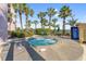Outdoor hot tub surrounded by lush palm trees and inviting patio furniture, perfect for relaxation and enjoyment at 2500 N Ocean Blvd. # 601, Myrtle Beach, SC 29577