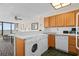 Modern kitchen leading into an open floor plan with ocean views and in-unit laundry at 2500 N Ocean Blvd. # 601, Myrtle Beach, SC 29577