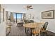 Spacious living area with dining space and large windows to ocean view at 2500 N Ocean Blvd. # 601, Myrtle Beach, SC 29577