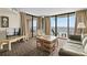 Open-concept living area with comfortable seating and balcony access with ocean view at 2500 N Ocean Blvd. # 601, Myrtle Beach, SC 29577