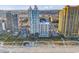 Beautiful aerial view of a beachside condo complex with pools and sandy beach access at 2504 N Ocean Blvd. # 2030, Myrtle Beach, SC 29577