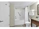Bathroom featuring a tub and shower combo with towels and a granite vanity at 2504 N Ocean Blvd. # 2030, Myrtle Beach, SC 29577