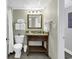 Bathroom featuring a vanity with granite counters, a decorative mirror, and a tiled floor at 2504 N Ocean Blvd. # 2030, Myrtle Beach, SC 29577