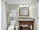 Bright bathroom featuring a wooden vanity, granite countertop, and a shower with a curtain at 2504 N Ocean Blvd. # 2030, Myrtle Beach, SC 29577