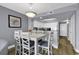Charming dining area with white furniture and a view into the kitchen, creating a welcoming space at 2504 N Ocean Blvd. # 2030, Myrtle Beach, SC 29577