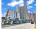 Impressive exterior view of a modern condo building with covered entry at 2504 N Ocean Blvd. # 2030, Myrtle Beach, SC 29577