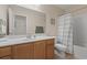 Well-maintained bathroom featuring a vanity with a sink, a toilet, and a shower-tub combination at 278 Carolina Crossing Blvd., Little River, SC 29566