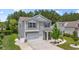 Charming two-story home with vinyl siding, a two-car garage, and a landscaped yard at 278 Carolina Crossing Blvd., Little River, SC 29566