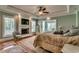 Bedroom with fireplace, tv, and private sitting area at 2790 Fowler Rd., Loris, SC 29569