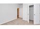 Comfortable bedroom with plush carpet, a closet, and neutral walls at 307 Dunlin Pl, Conway, SC 29526