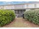 The backyard features a grill and a screened-in porch that offers a great area for relaxation at 310 Kiskadee Loop # D, Conway, SC 29526