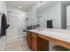 Well-lit bathroom with a shower and vanity at 310 Kiskadee Loop # D, Conway, SC 29526