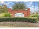 Welcoming community sign amid lush greenery and landscaping at 310 Kiskadee Loop # D, Conway, SC 29526