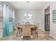 Charming dining area with round table, stylish chairs, and ample natural light at 310 Kiskadee Loop # D, Conway, SC 29526