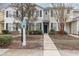 Inviting townhouse with classic curb appeal, featuring neutral siding, walkway and reserved parking for easy access at 310 Kiskadee Loop # D, Conway, SC 29526