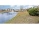 Picturesque pond view highlighting the tranquil water feature and surrounding condo buildings at 310 Kiskadee Loop # D, Conway, SC 29526