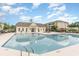 Community pool featuring a sun deck, lounge chairs, and access to grilling stations for outdoor enjoyment at 310 Kiskadee Loop # D, Conway, SC 29526