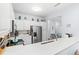 Bright kitchen featuring white countertops, stainless steel appliances, and ample cabinet space for storage at 3104 Sweetwater Blvd. # 3104, Murrells Inlet, SC 29576