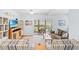 Comfortable living room featuring a sliding glass door leading to a patio, perfect for relaxation and entertainment at 3104 Sweetwater Blvd. # 3104, Murrells Inlet, SC 29576