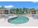 Refreshing community pool surrounded by ample seating and well-maintained landscaping at 3104 Sweetwater Blvd. # 3104, Murrells Inlet, SC 29576