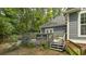 View of the backyard deck with direct access to the house and featuring a relaxing lounge chair at 3180 Long Avenue Ext., Conway, SC 29526