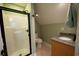 Bathroom features a vanity with granite countertop and a stand-up shower with glass door at 3180 Long Avenue Ext., Conway, SC 29526