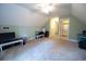 A bonus room features neutral carpet, a ceiling fan, and access to the attic bathroom at 3180 Long Avenue Ext., Conway, SC 29526