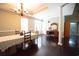 Dining area featuring hardwood floors, large window, and access to other living spaces at 3180 Long Avenue Ext., Conway, SC 29526