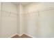 A walk-in closet features carpeted floors and shelving at 335 Garden Grove St, Conway, SC 29526