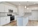 Kitchen with stainless steel appliances, granite countertops, and a functional island at 335 Garden Grove St, Conway, SC 29526