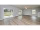 Spacious living room features sliding glass doors leading to outdoor patio at 335 Garden Grove St, Conway, SC 29526