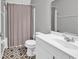 Bathroom featuring a shower with a curtain, vanity, mirror, toilet and tile floor at 340 Boxcar Dr., Longs, SC 29568