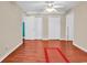 Large bedroom with hardwood floors and multiple closets and access to another bedroom at 340 Boxcar Dr., Longs, SC 29568