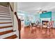 Inviting living room featuring beautiful hardwood floors and a cozy fireplace at 340 Boxcar Dr., Longs, SC 29568