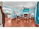 Inviting living room featuring beautiful hardwood floors and a cozy fireplace at 340 Boxcar Dr., Longs, SC 29568