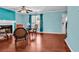 Inviting living room featuring hardwood floors and a cozy fireplace at 340 Boxcar Dr., Longs, SC 29568