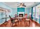 Inviting living room featuring beautiful hardwood floors and a cozy fireplace at 340 Boxcar Dr., Longs, SC 29568