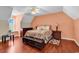 Spacious main bedroom with hardwood floors and natural light at 340 Boxcar Dr., Longs, SC 29568