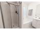 Clean bathroom with separate shower and tub featuring a frosted window providing privacy and natural light at 359 Harbour Reef Dr., Myrtle Beach, SC 29588