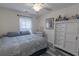 Comfortable bedroom featuring a bed, a ceiling fan, and a dresser with lots of storage space at 359 Harbour Reef Dr., Myrtle Beach, SC 29588