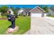 Charming home with a brick facade, a well-manicured lawn, and a two-car garage at 359 Harbour Reef Dr., Myrtle Beach, SC 29588