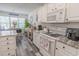 Bright kitchen featuring white appliances, updated countertops, and modern cabinetry at 359 Harbour Reef Dr., Myrtle Beach, SC 29588