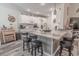 Eat-in kitchen island with granite countertops and three stools, seamlessly blending style and functionality at 359 Harbour Reef Dr., Myrtle Beach, SC 29588