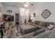 Inviting living room featuring a plush sofa, stylish decor, and wood flooring at 359 Harbour Reef Dr., Myrtle Beach, SC 29588