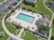 Stunning aerial view of a community pool with ample lounge chairs and well-maintained landscaping at 3676 Clay Pond Village Ln. # 4, Myrtle Beach, SC 29579
