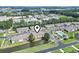 Overhead shot of a neighborhood boasting inviting ponds, a community pool, and convenient parking areas at 3676 Clay Pond Village Ln. # 4, Myrtle Beach, SC 29579
