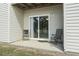 Charming back patio with chairs, perfect for enjoying peaceful moments and serene outdoor scenery at 3676 Clay Pond Village Ln. # 4, Myrtle Beach, SC 29579