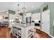 Elegant kitchen featuring a granite island, stainless steel appliances, and hardwood flooring at 3736 Kingsley Dr., Myrtle Beach, SC 29588